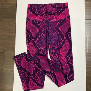Niyama Sol punk and purple python leggings